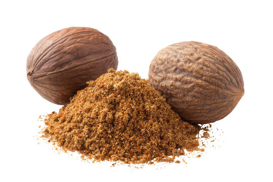 Whole nutmeg seeds and ground nutmeg spice isolated on transparent background. Nutmeg spice whole and ground powder isolated on white background.
