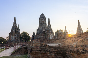 Obraz premium Ancient beautiful Wat Phra Si ruins bathed in peaceful serene morning sunlight showcasing historic Thai architecture old stone stupa peaceful atmosphere culture travel destionation