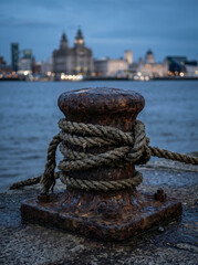 Fototapeta premium Mooring Bollard with Rope at Dusk