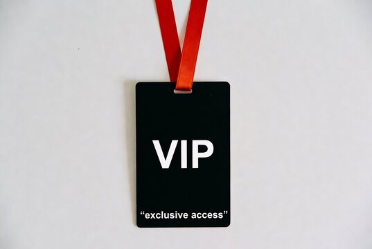 A black VIP access badge with a red ribbon is displayed on a white background.