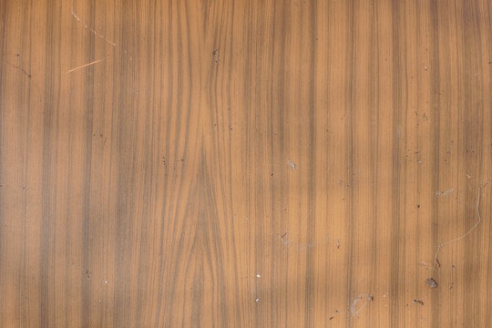 wooden texture of brown dirty plywood board