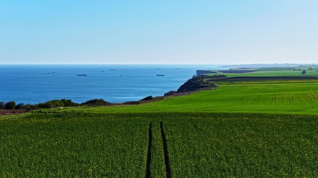 Longues-sur-Mer, Normandy coast, historic battery site with ship wracks at sea