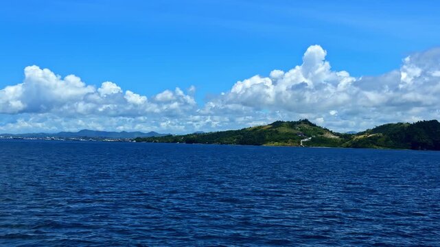Beautiful blue ocean water and green islands at Catangnan Siargao