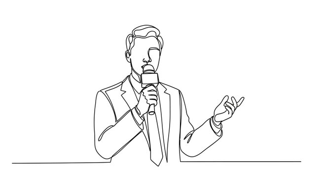 Businessman speaking into a microphone.