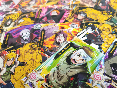 Naruto cards. Indonesian youths playing these collectible cards for have fun