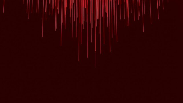 Static shot of red vertical streaks falling and streaming in abstract graphic pattern against dark background on screen