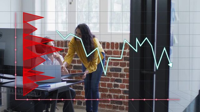 Woman leaning showing folder over laptop to seated man, cyan zigzag and red bars plotting business