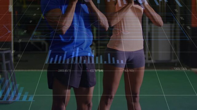 Fitness partners initiating set, performing synced goblet squats on turf while HUD graphs updating