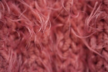 Obraz premium Pink long hair fur texture close-up, soft fluffy textile background
