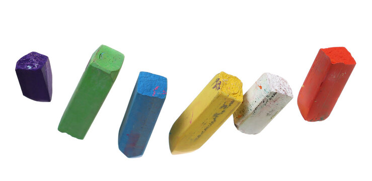 flying broken colorful chalk pieces, isolated on white background, clipping path, design element