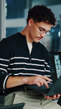 Typing, thinking and man with programming, laptop for software development and choice. IT specialist, person and programmer in workplace, pc for cybersecurity research and solution with coding tech