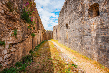 Fototapeta premium New Venetian Fortress in corfu city. Historic 16th-century Venetian fortified castle view on the city and the sea. Corfu, Greece