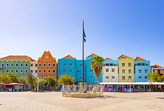 Willemctad, Curacao - 22.03.2026: Colorful facades of Brion City Hotel and Dutch colonial buildings at Brion Square in Willemstad Curacao under sky