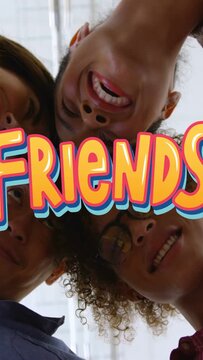 Vertical video: Friends huddling over lens, leaning in and laughing, creating tech FRIENDS overlay