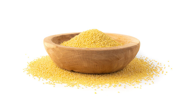 Raw millet grains pile isolated. Little yellow cereal, natural foxtail small seeds