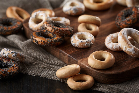 Traditional sushki and bagels on wooden board