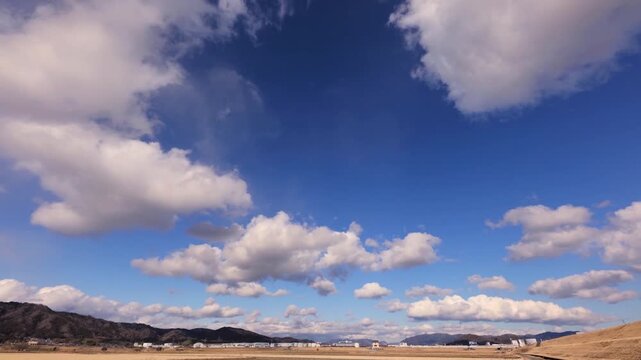 HD Short Timelapse of Thick Clouds Moving from Left to Right (6 Seconds, No Audio)