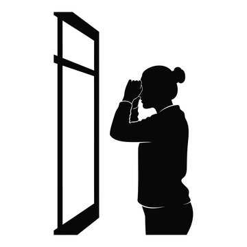 Silhouette of a woman looking through a magnifying glass