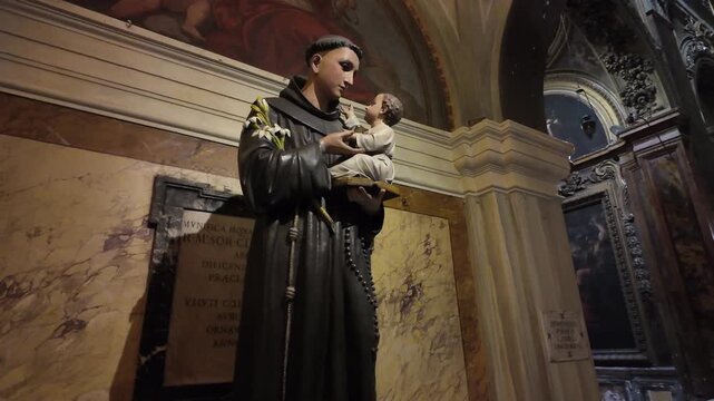 Statue Of Saint Anthony Of Padua Holding Child Jesus In Church
