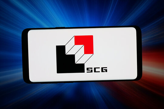 Stuttgart, Germany - 04-13-2026: In this photo illustration, the logo of company Shanghai Construction Group (SCG) is displayed on a smartphone in front of abstract background on computer screen.