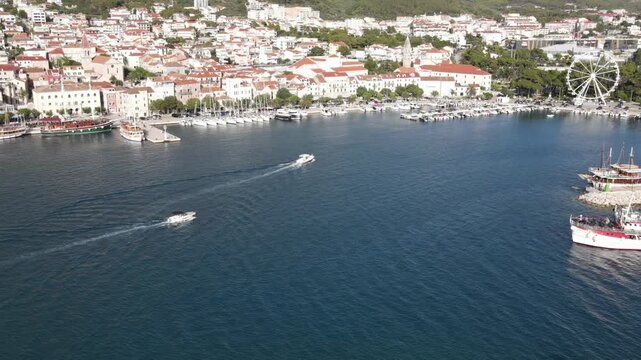 Makarska, Croatia. Coastal town, sea and mountains, Aerial photography from a drone. Croatian town on the Adriatic Sea. Makarska Riviera