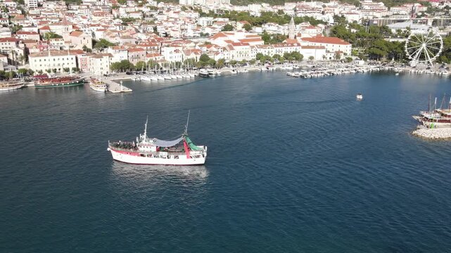 Makarska, Croatia. Coastal town, sea and mountains, Aerial photography from a drone. Croatian town on the Adriatic Sea. Makarska Riviera