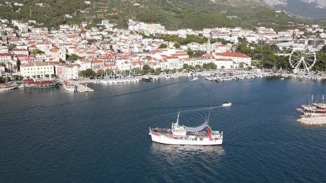 Makarska, Croatia. Coastal town, sea and mountains, Aerial photography from a drone. Croatian town on the Adriatic Sea. Makarska Riviera