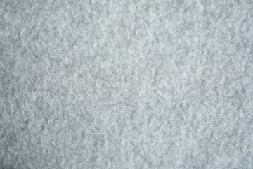 grey fleece fabric texture, macro texture fleece gray fabric photo above as background macro texture of grey fleece fabric. Close-up of soft synthetic textile surface with fine fibers and smooth fluf  © Анна Климчук