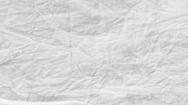 white crumpled paper texture loopable 4k background. abstract crinkled parchment texture 4k loopable background alpha channel.