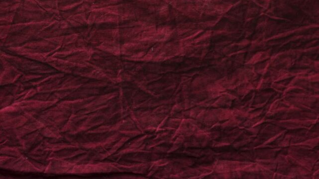 red burgundy crinkled fabric texture background loopable 4k overlay with alpha channel. red crumpled linen fabric surface 4k.