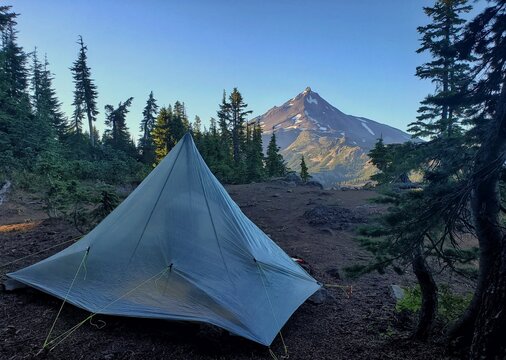 Ultralight ZPacks Pyramidal Tent Pitched at a Remote Backcountry Campsite with a Morning View of Mount Jefferson