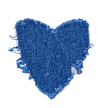 Heart-shaped denim patch on a white background for crafting or clothing repair