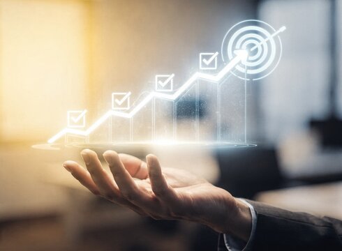 A business professional holds a glowing holographic growth chart with checkmark icons leading to a target symbol, representing corporate success, strategic planning, and achievement in modern office.