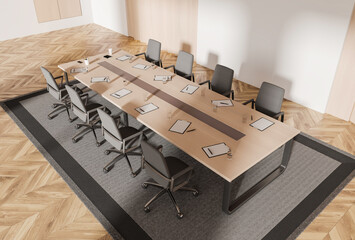 Naklejka premium Conference room interior with meeting table and chairs shown from top view in minimal design on light background, concept of workspace efficiency, 3D Rendering