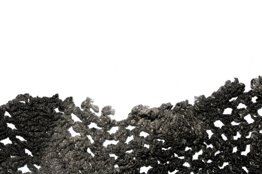 Close up of vintage black gothic lace fabric white on black background embroidery