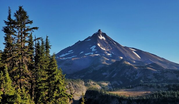 Crisp Morning View of Mount Jefferson Rising Above Subalpine Ridges and Dense Conifer Forests in the Oregon High Cascades