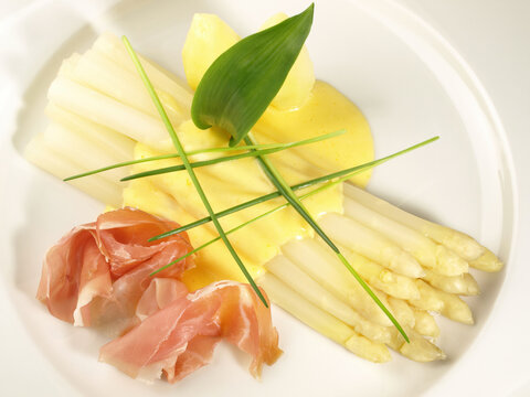 White Asparagus with Sauce Hollandaise, smoked Ham and Potatoes