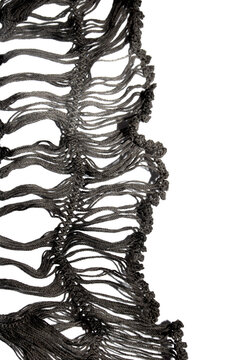 Close up of vintage black gothic lace fabric white on black background embroidery