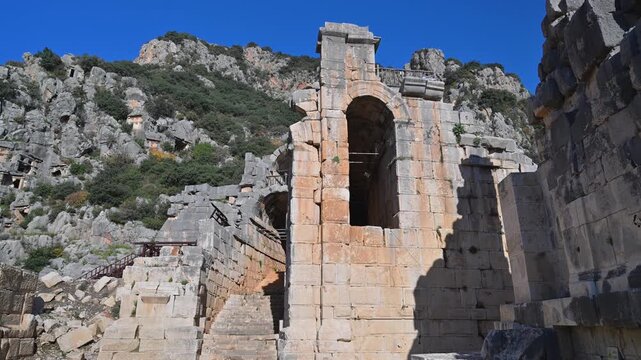 Ancient theater ruins and Lycian rock cut tombs in Myra, Turkey