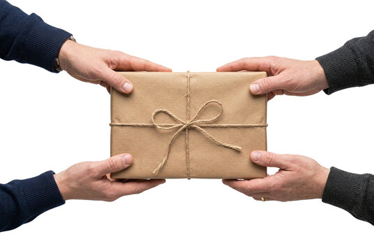 Hands exchanging cardboard gift box parcel