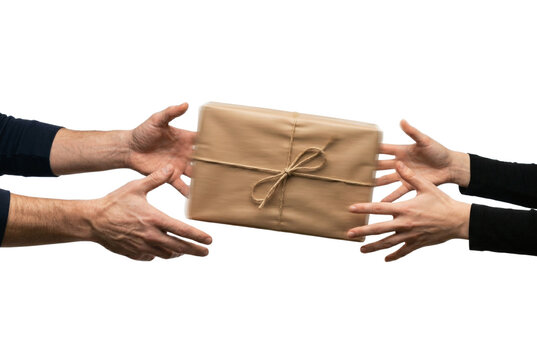 Hands passing a brown paper wrapped gift parcel