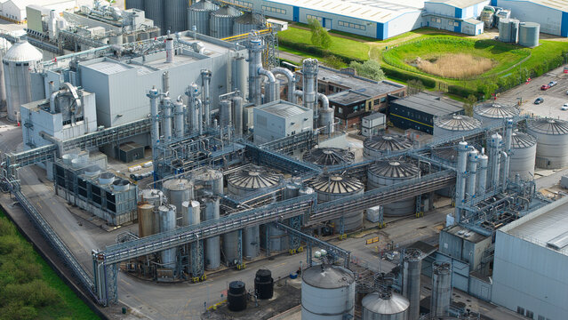 Aerial view of Sedamyl Industrial Factory with its complex network of pipes, storage tanks, and industrial silos in Selby, England, United Kingdom.