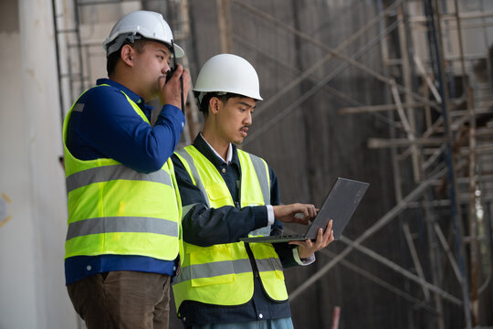 Construction site workers collaborate on project planning urban location business environment professional viewpoint teamwork concept