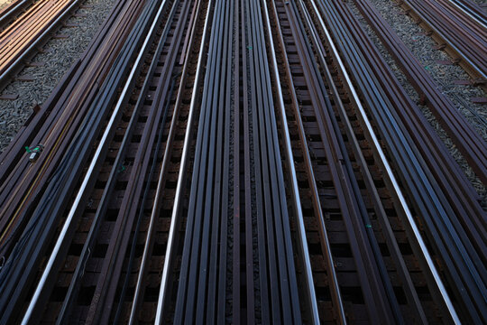 Many parallel train tracks create a repeating pattern