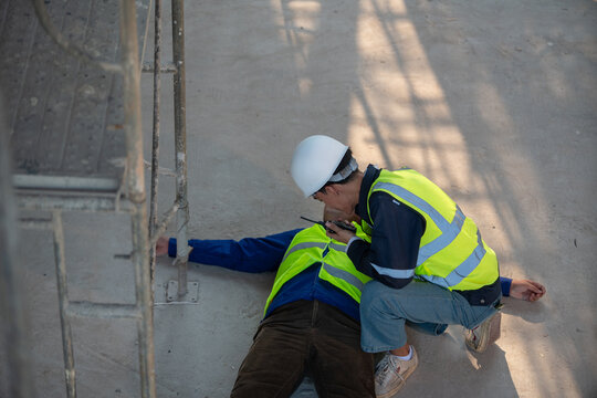 Workplace emergency response construction site photograph safety training ground level first aid