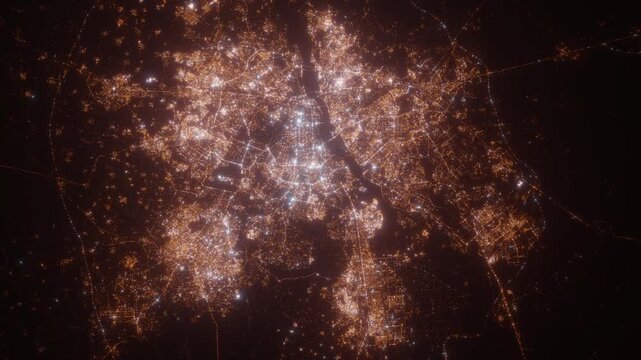 New Delhi (India) aerial view at night. Top view on modern city with glow effect. Camera is zooming out, rotating counterclockwise