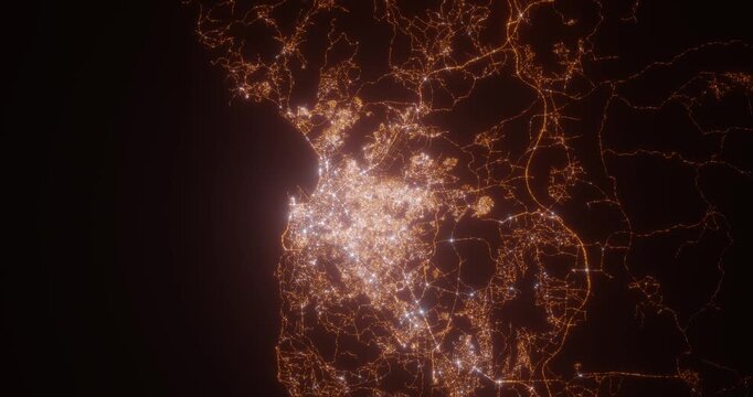 Tangier (Morocco) aerial view at night. Top view on modern city with street lights. Camera is zooming out, rotating counterclockwise. Vertical video. The north is on the left side