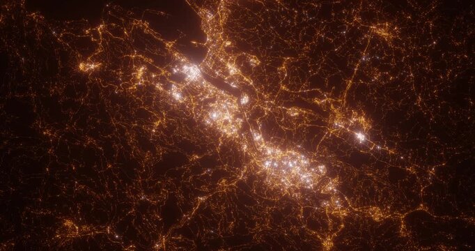 Bilbao (Spain) aerial view at night. Top view on modern city with street lights. Camera is zooming out, rotating clockwise