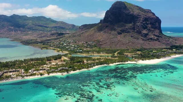 Tropical scenery, beautiful beaches of Mauritius island, Le Morne, popular luxury resort. Le Morne beach luxury resorts, Mauritius. Luxury beach in Mauritius, sandy beach with palms and blue ocean.