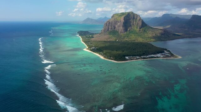 Aerial view of Mauritius island panorama and famous Le Morne Brabant mountain, beautiful blue lagoon and underwater waterfall. Le Morne Brabant peninsula and Underwater Waterfall, Mauritius.